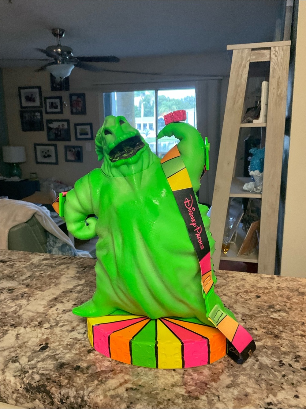 Disney Green Oogie Boogie Figure with Neon Multicolor Strap Popcorn Bucket